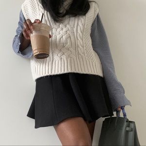 Miu Miu Mini Wool Skirt in Black 38